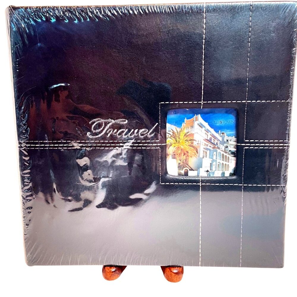 Black Faux Leather Photo Album with Picture Window and labeled Travel